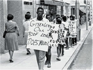 Protesters marched daily to demand that the Durham City Council enforce the local housing code against slumlord Abe Greenberg. Photograph by Billy E. Barnes, courtesy of the North Carolina Collection, Wilson Library, University of North Carolina at Chapel Hill, Billy Ebert Barnes Collection.